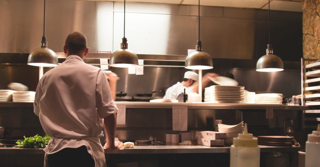 Image of the cooking staff working in a fast-paced restaurant.